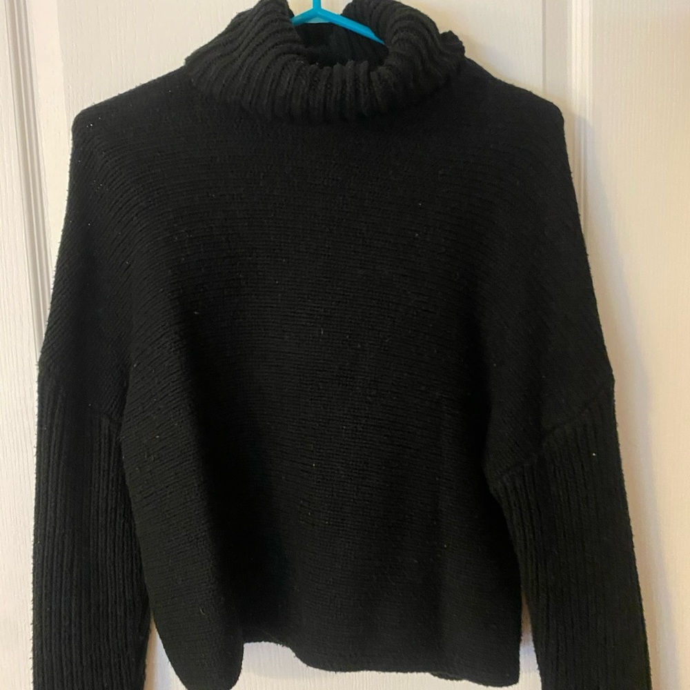 Black turtle neck sweater
